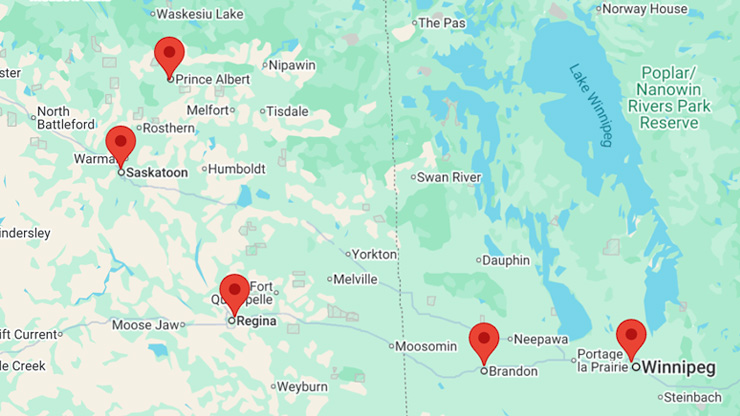 map showing dealer locations across Manitoba and Saskatchewan including Prince Albert, Saskatoon, Regina, Brandon